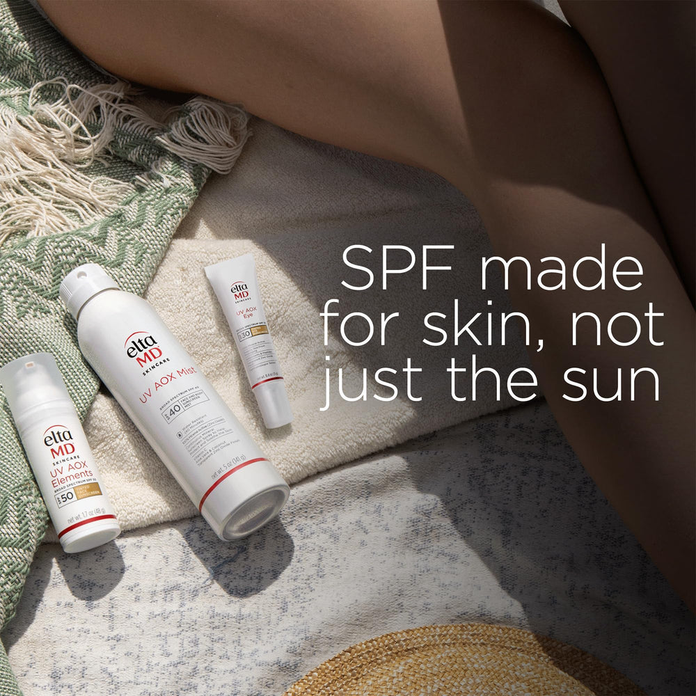 Model applying EltaMD tinted sunscreen outdoors showing natural finish