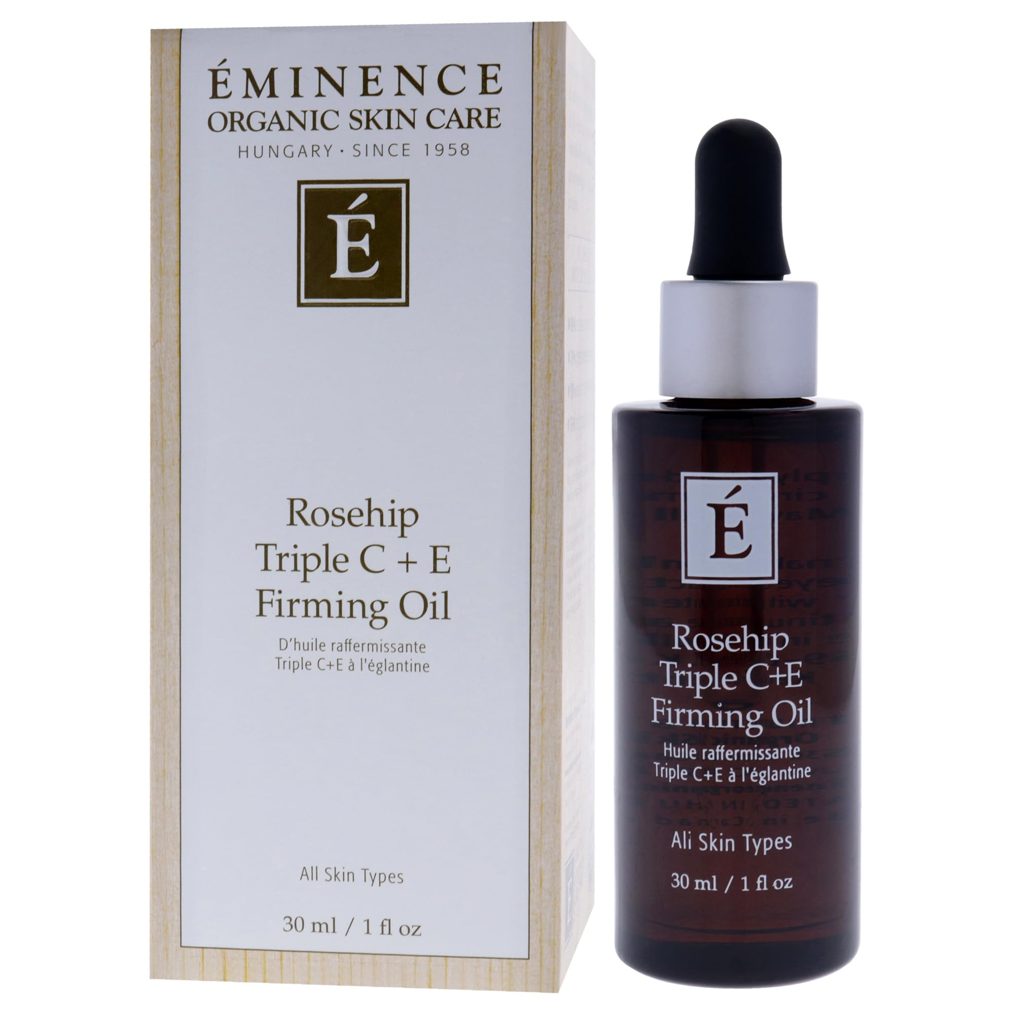 Eminence bottle next to coin for 1 oz size comparison and travel-friendly convenience