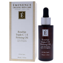 Eminence bottle next to coin for 1 oz size comparison and travel-friendly convenience