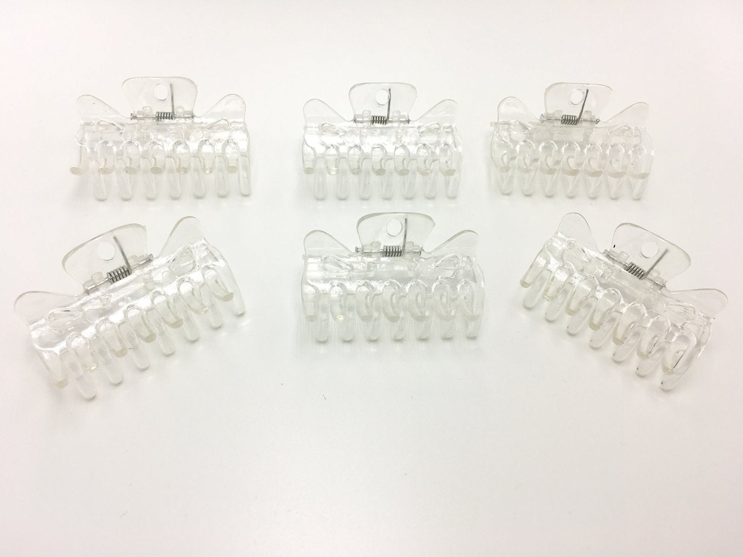 Emivery front packaging showing six clear mini hairpins and handy storage