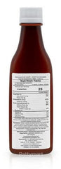 emulsion de scott spoon serving beside bottle, displays 5.03 ml serving size and portion guidance