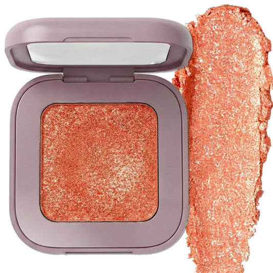 Enfuntins compact front view showing coral-orange gold duochrome shimmer benefit