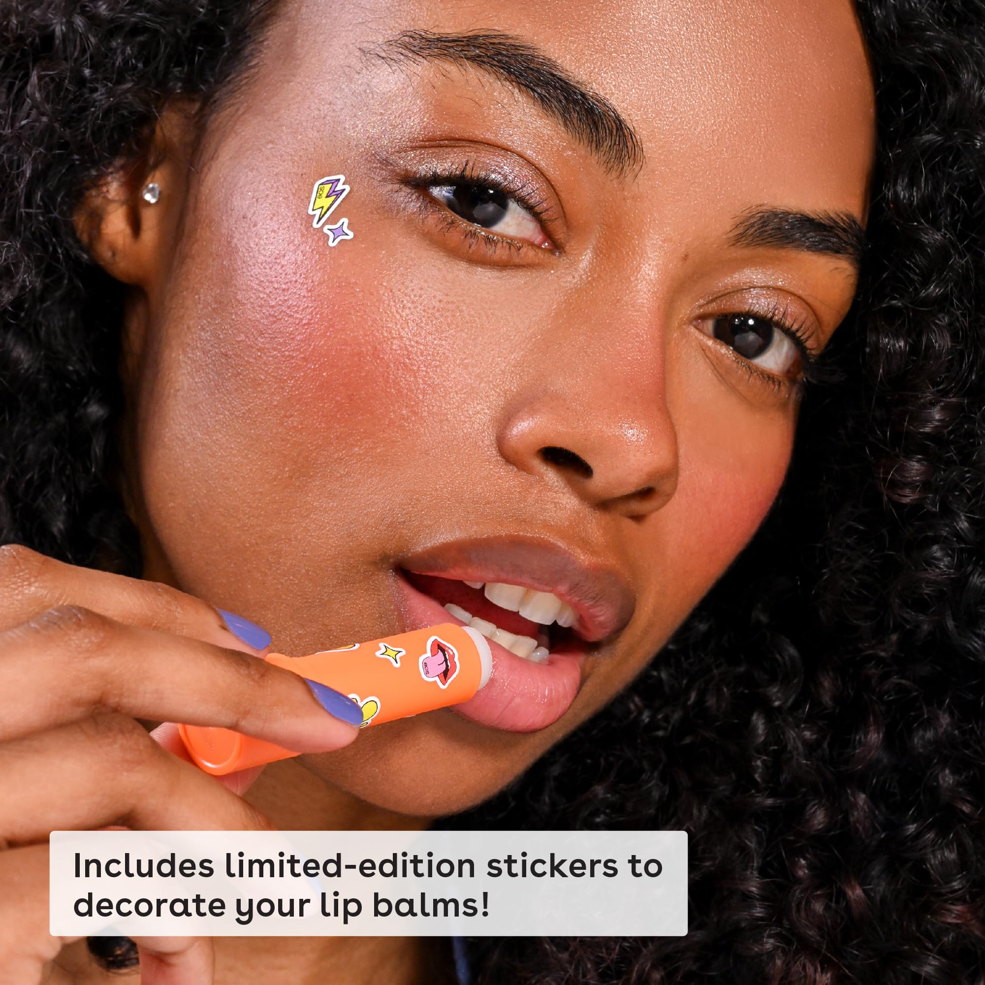 eos balms in hand to show scale and portable convenience for travel