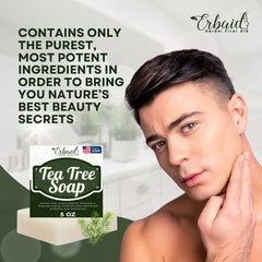 Erbaid soap beside coconut and tea tree leaves showing natural ingredients