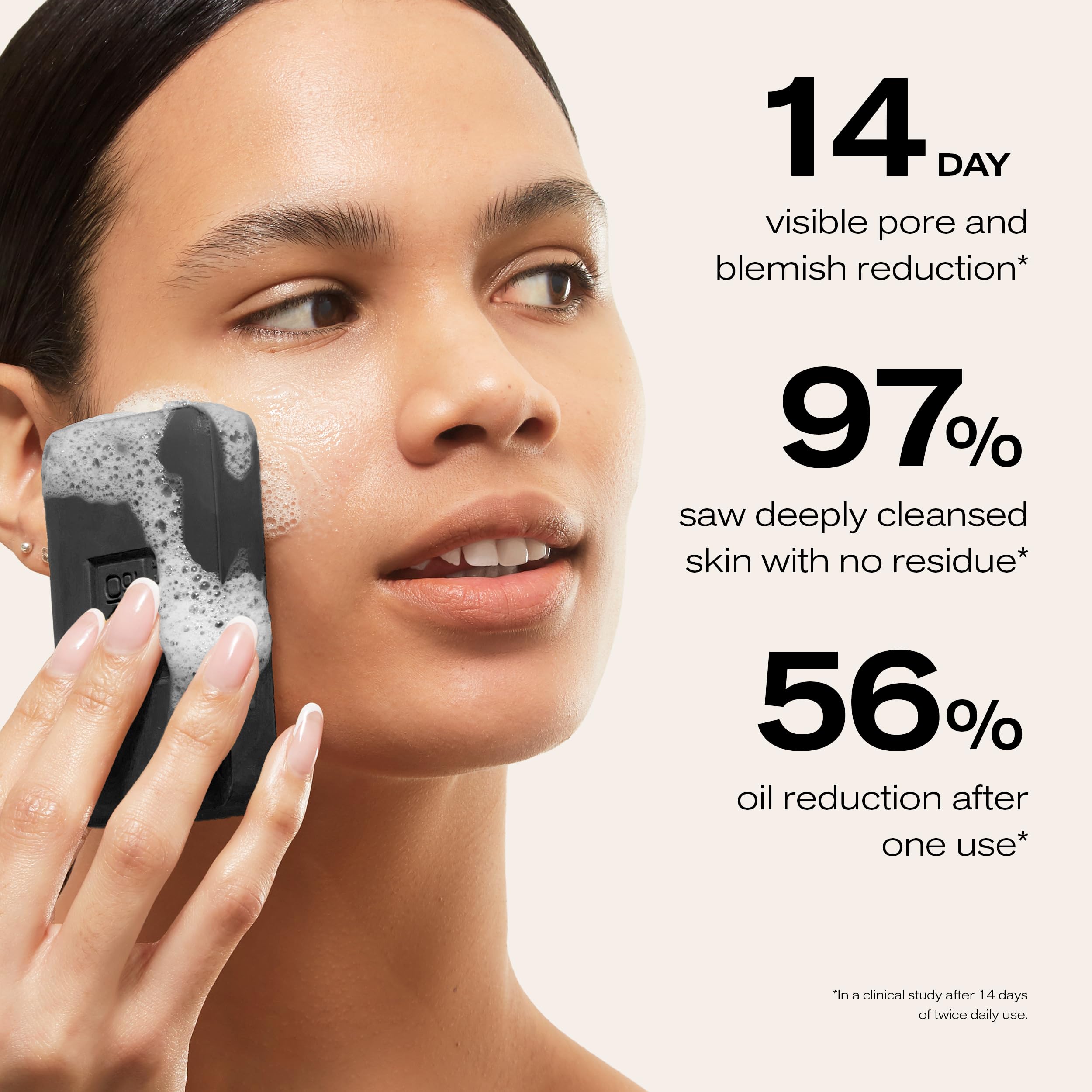 Erno Laszlo cleansing bar held in hand showing compact travel size