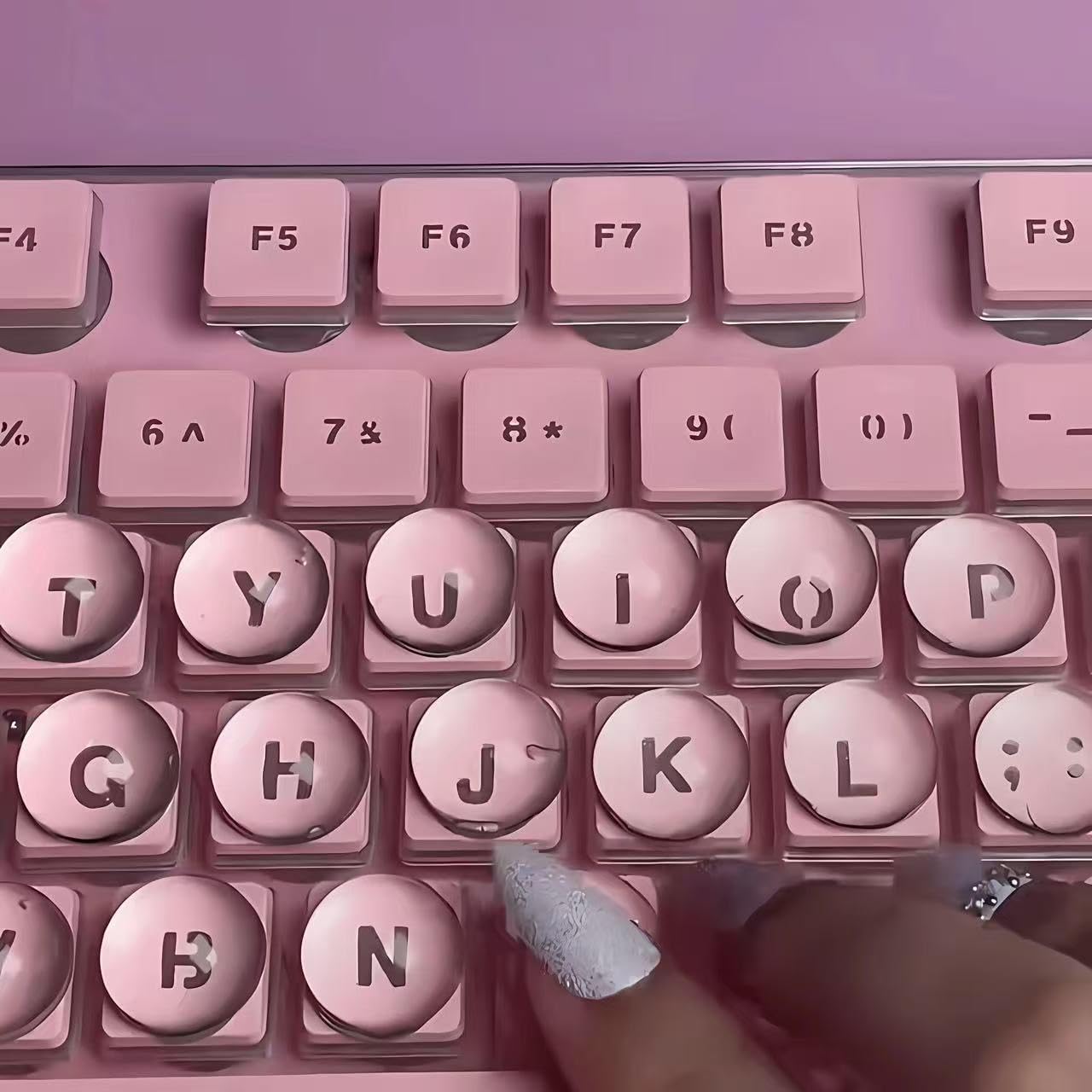ERRECI keycap next to ruler showing raised 0.15 inch height for ergonomic benefit