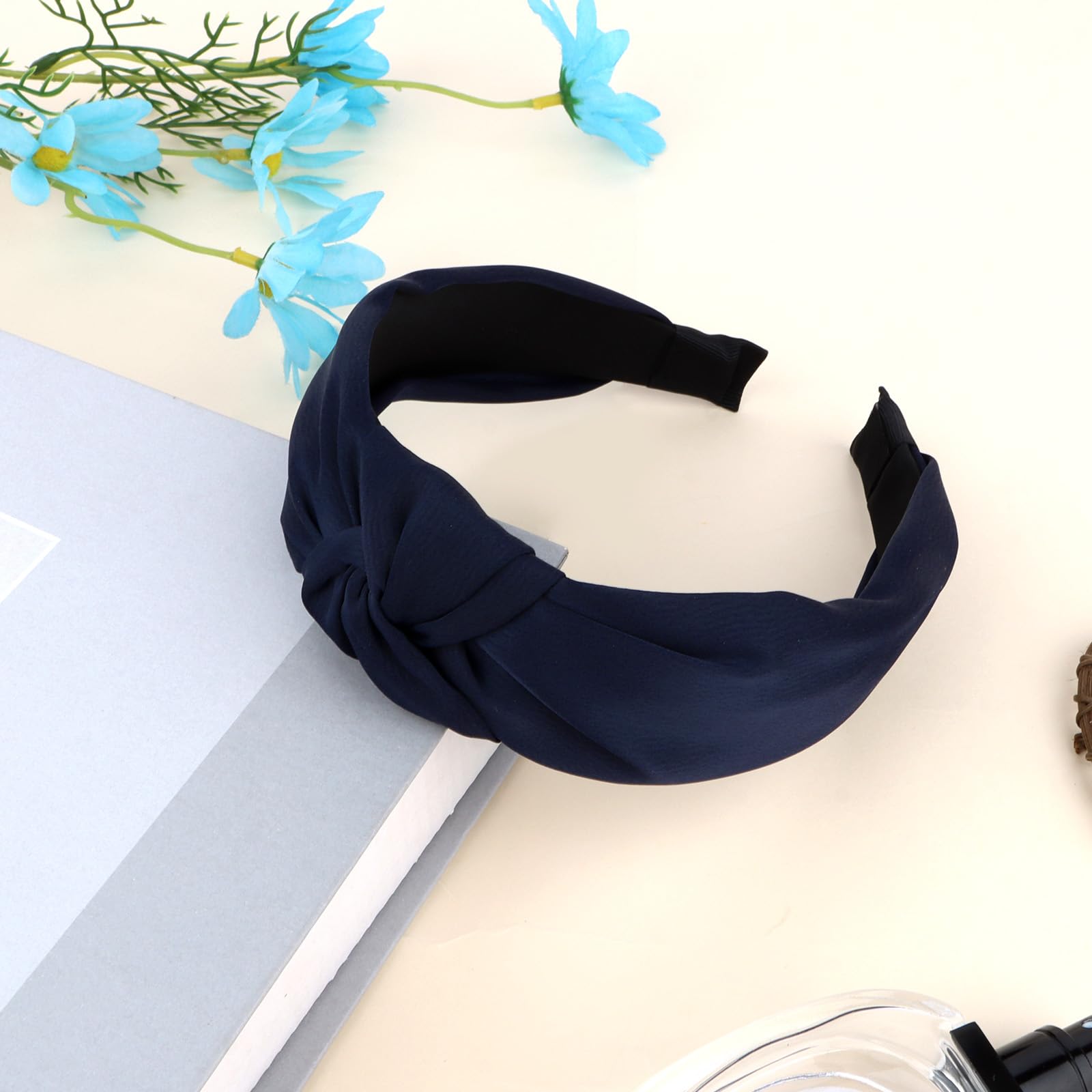 Esitrormi styled with outfit outdoors showing versatile navy accessory boosting any look