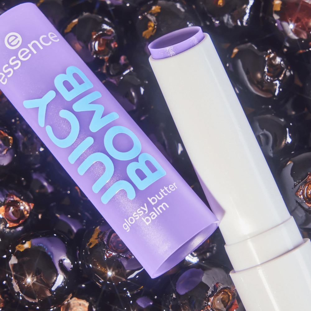 essence balm held in hand to show scale and travel-friendly size benefit