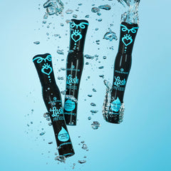 Essence Cosmetics mascaras held in hand showing compact size and portability