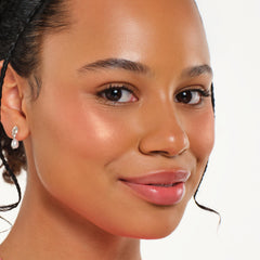 Essence Cosmetics blush being applied with brush for easy buildable color benefit