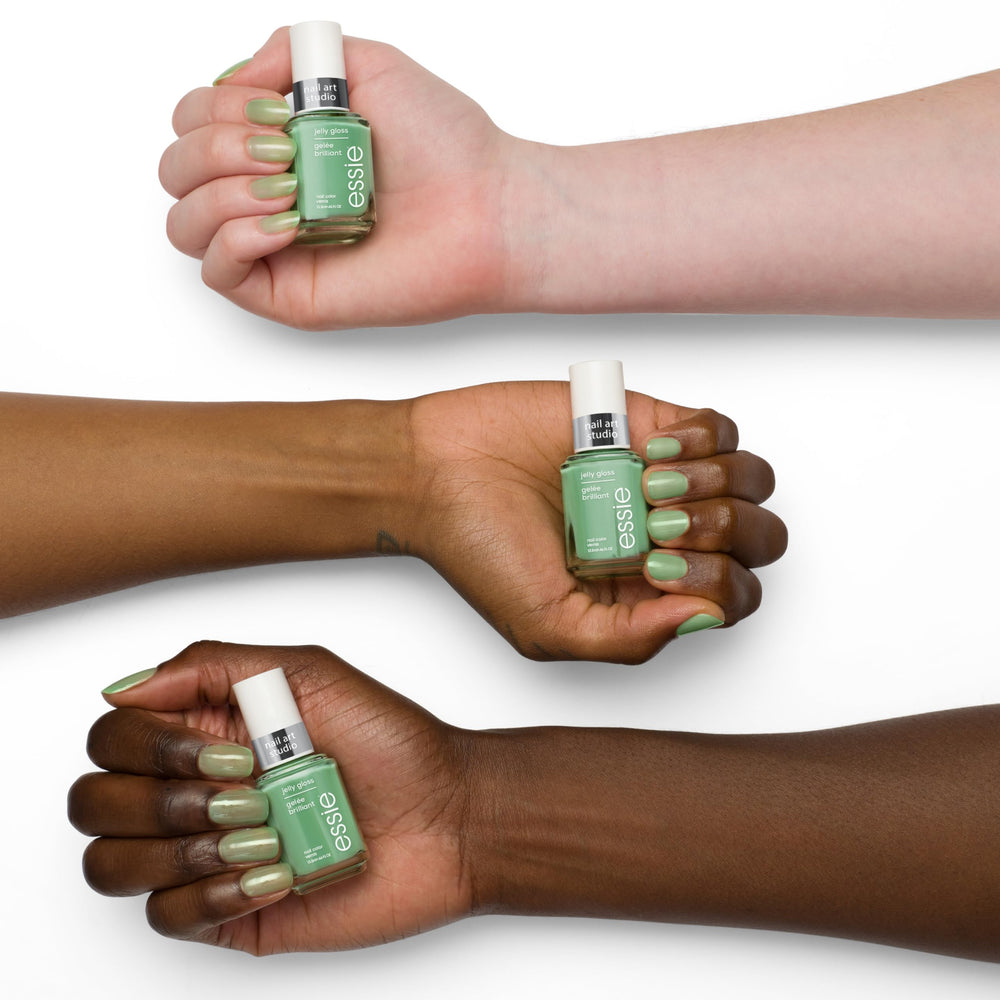 essie on-fingers lifestyle shot showing wearable green manicure benefit
