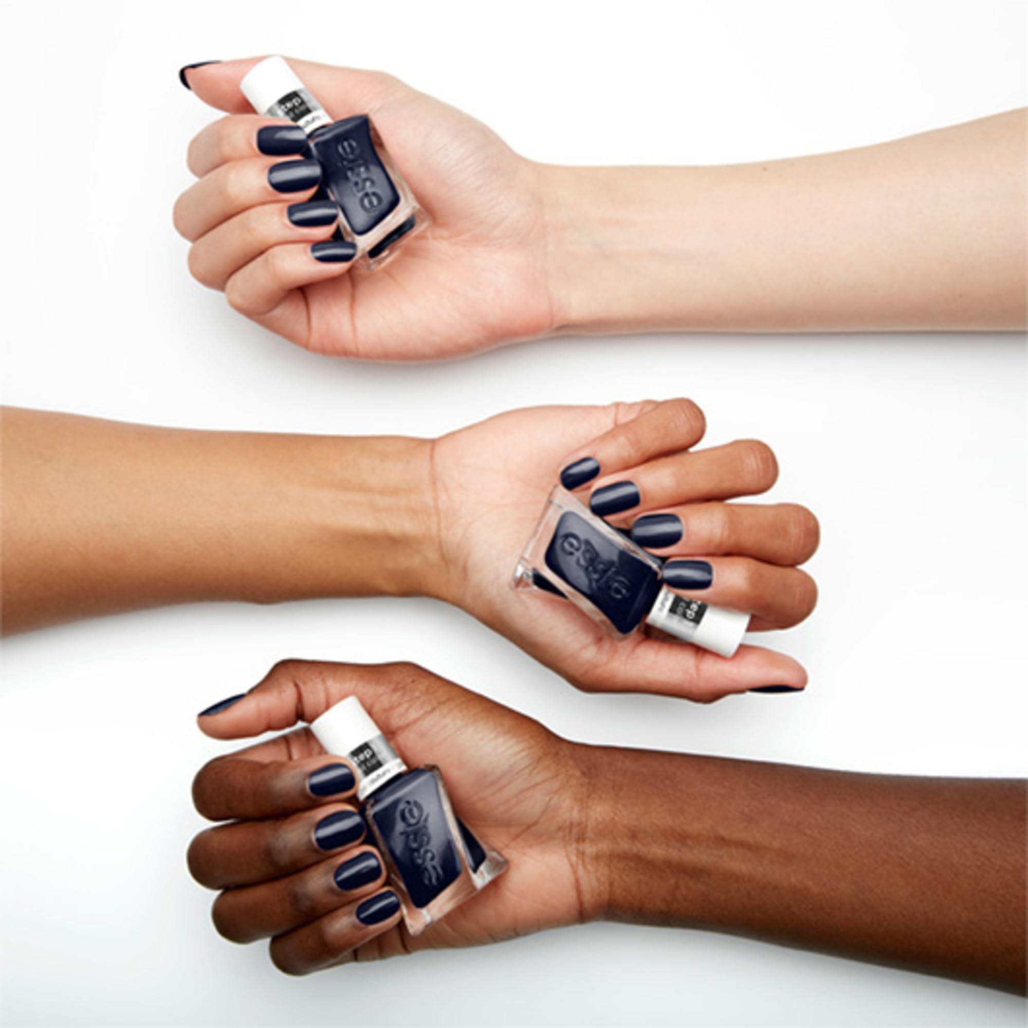 essie navy Caviar Bar swatch on nail wheel displaying rich pigment and opacity
