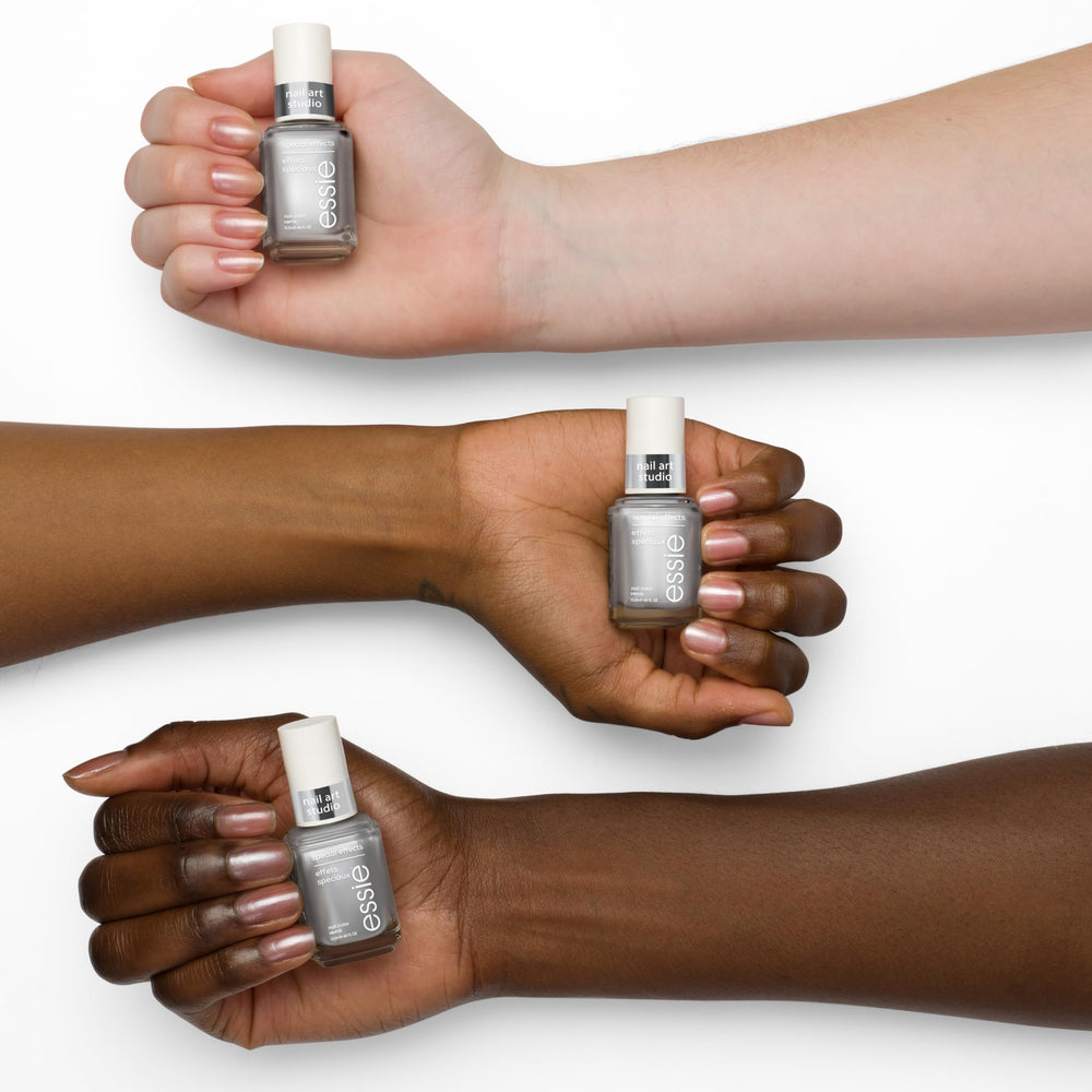 essie layered over dark polish showing intense chrome reflection benefit