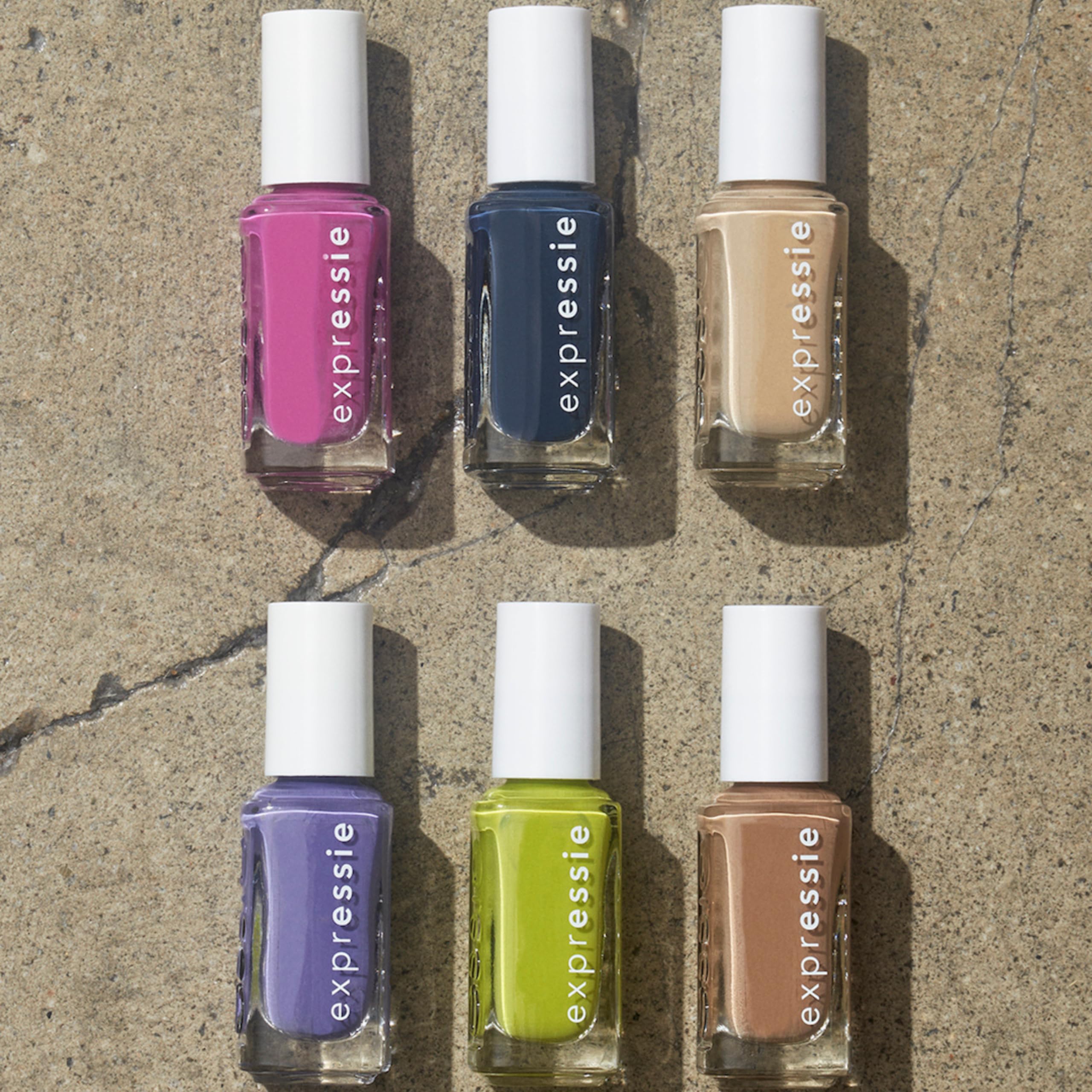 essie bottle beside credit card illustrating compact travel-friendly size