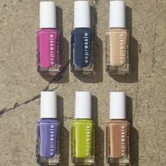 essie bottle beside credit card illustrating compact travel-friendly size