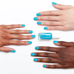 essie blue polish swatch on nail wheel showing true color payoff