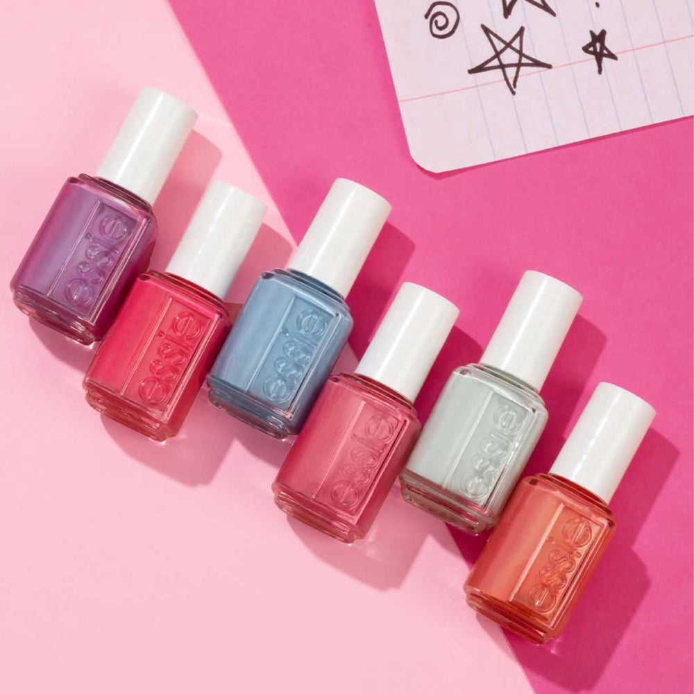 essie painted fingernails with first kiss bliss showing clean finish