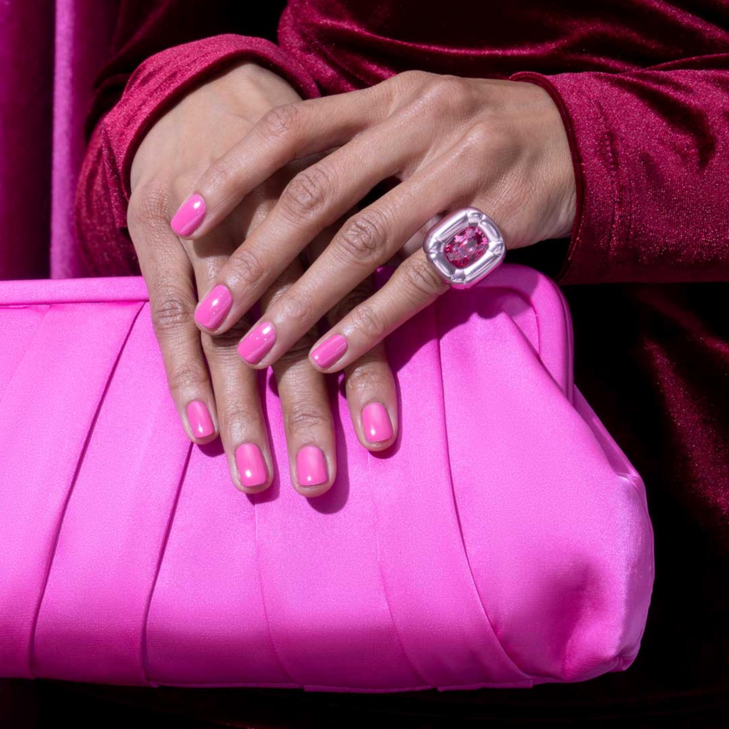 essie gel couture swatch on nail wheel showing true pink color and chip resistance