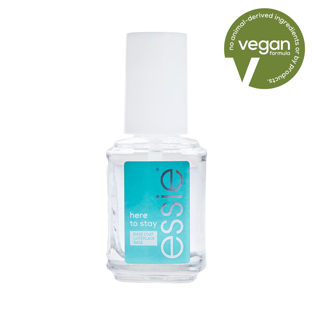 essie brush applying Here To Stay base coat for smooth adhesion and even coverage