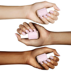essie painted nails swatch on hand showing natural sheer pink result
