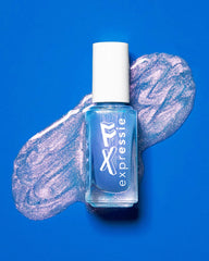 essie bottle beside coin for scale showing compact 0.33 fl oz benefit travel-friendly