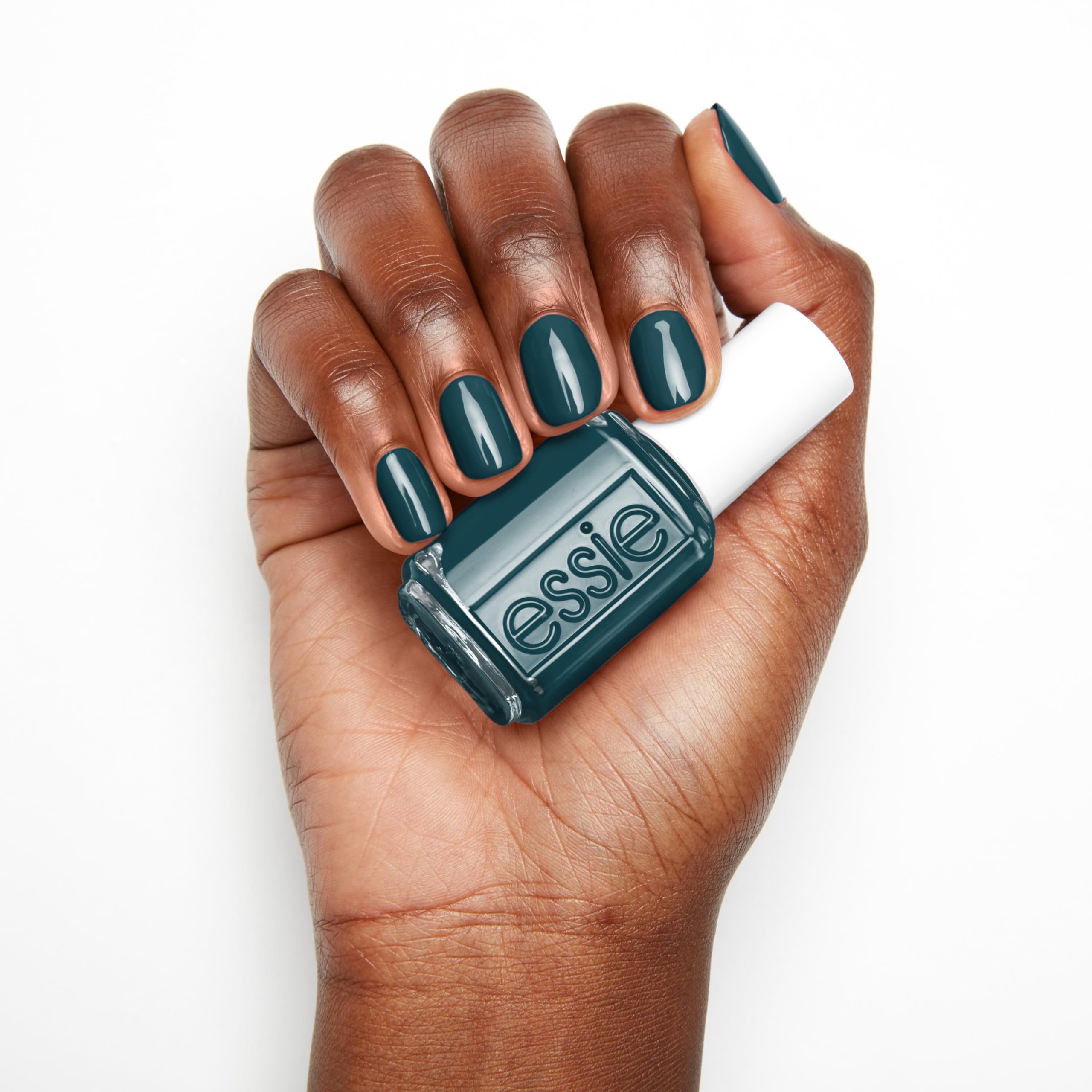 essie bottle beside cuticle oil highlighting complete nail-care routine