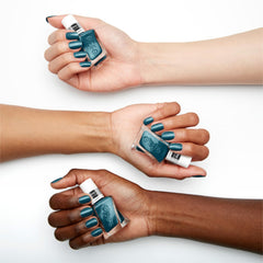 essie swatch on nails displaying rich teal color and glossy gel-like shine