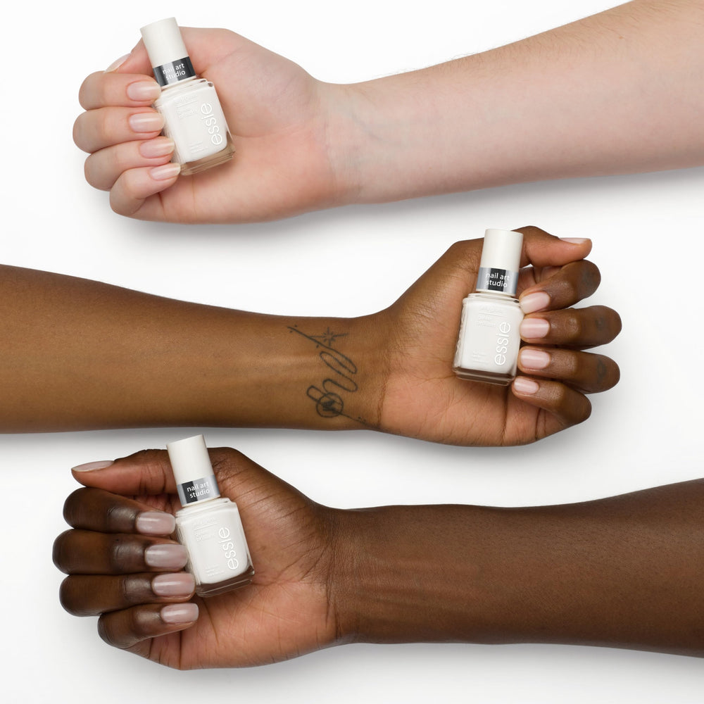 essie layered milky glaze on nails showing glossy depth benefit