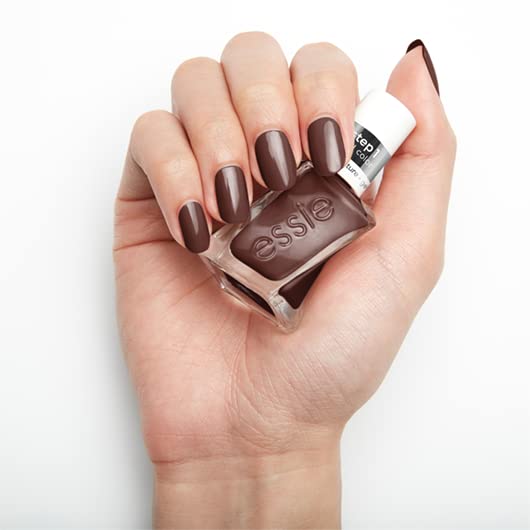 essie nail polish styled with outfit to show how raisin brown complements fashion looks