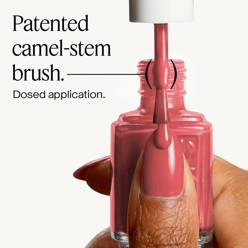 essie bottle next to ruler showing 13.5 ml scale for size reference