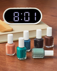 essie size scale hand comparison showing bottle volume and practicality