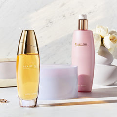 Estée Lauder applying lotion to arm demonstrating smooth spread and instant skin comfort benefit