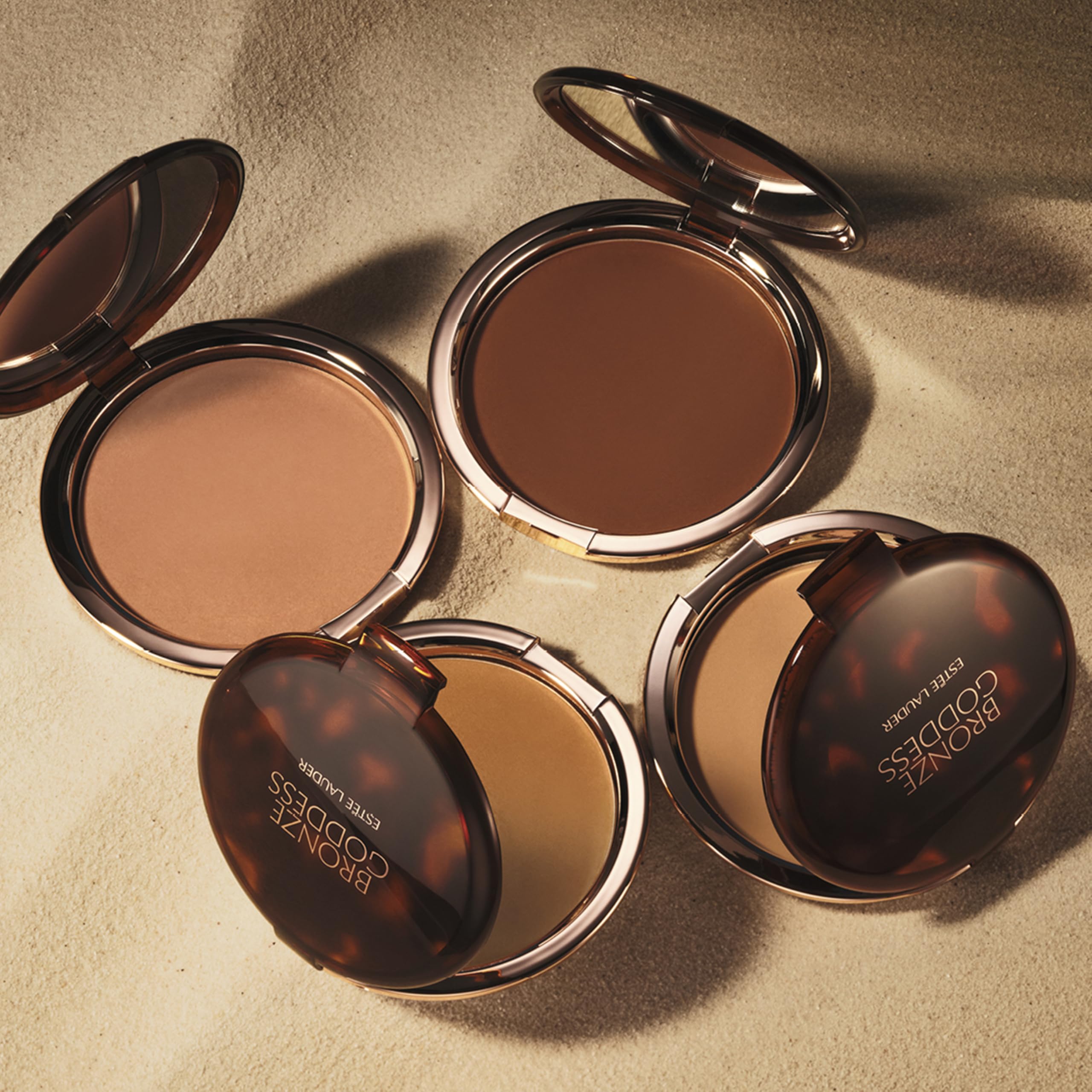 Estée Lauder bronzer swept on shoulders and décolletage creating warm, sun-kissed effect