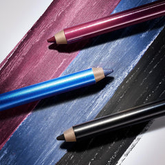 Estée Lauder pencil in hand to show scale and easy application on the go