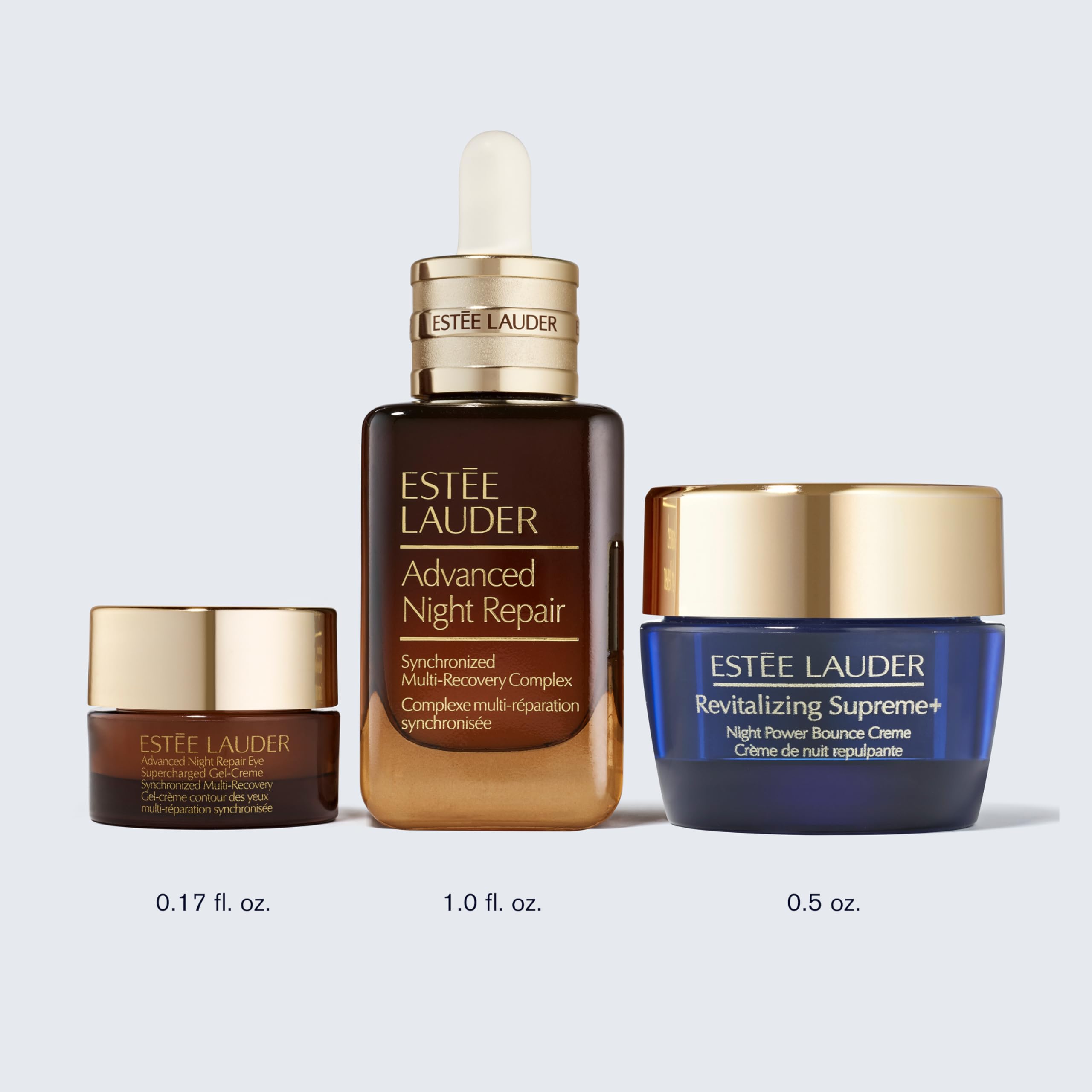 Estée Lauder products in hand to show scale and portable travel convenience