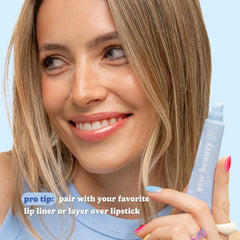 ESW Beauty layered under lipstick demonstrating added shine and protective layer