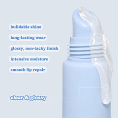 ESW Beauty shown on fingertip for scale to indicate portable, travel-friendly size
