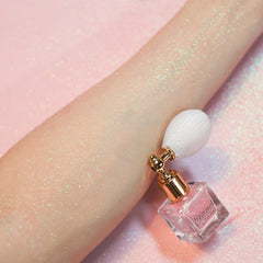 Etercycle glitter texture loose pink powder showing fine shimmer and blendability