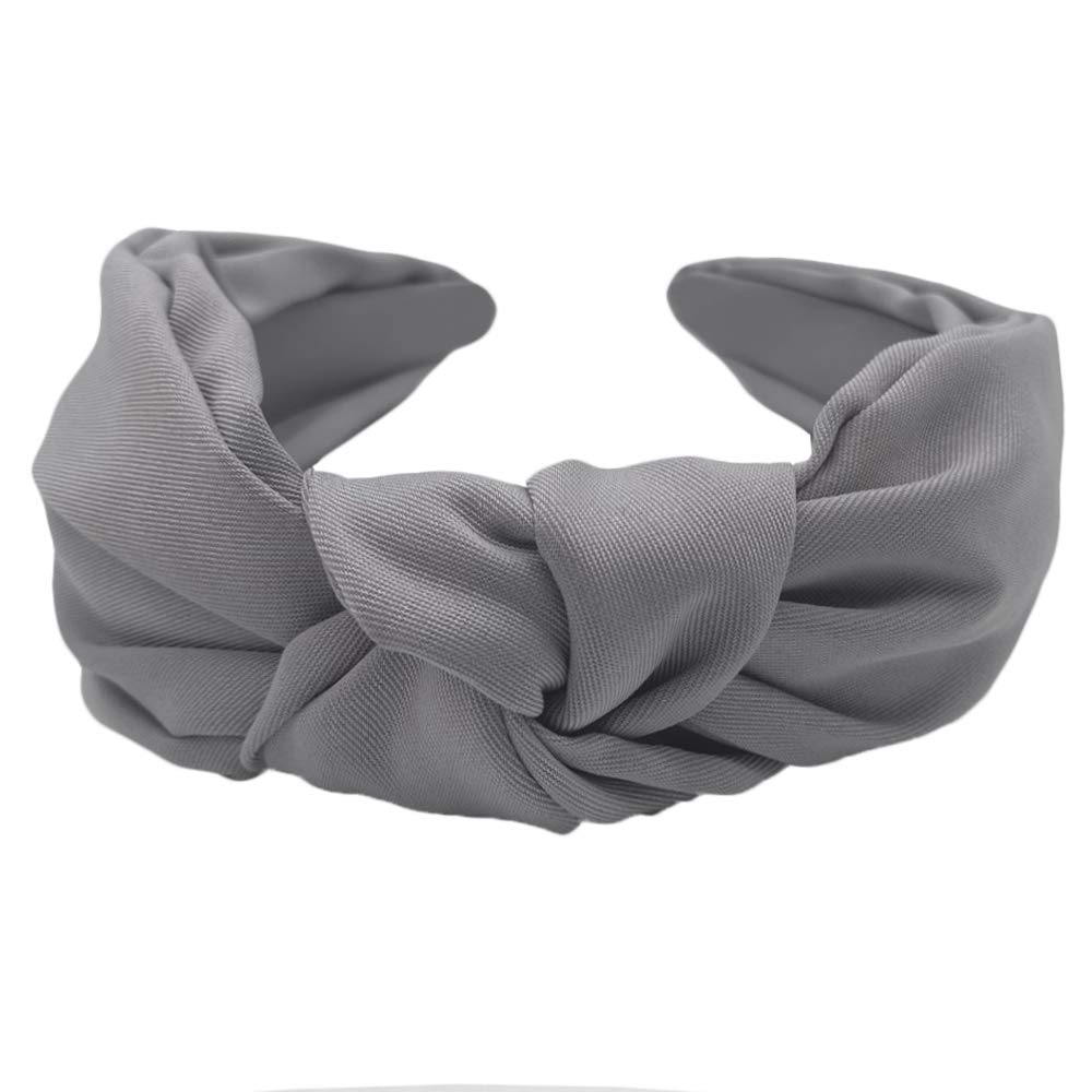 Etercycle headband being worn during yoga demonstrating stable hold and sweat‑friendly fit
