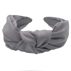 Etercycle headband being worn during yoga demonstrating stable hold and sweat‑friendly fit