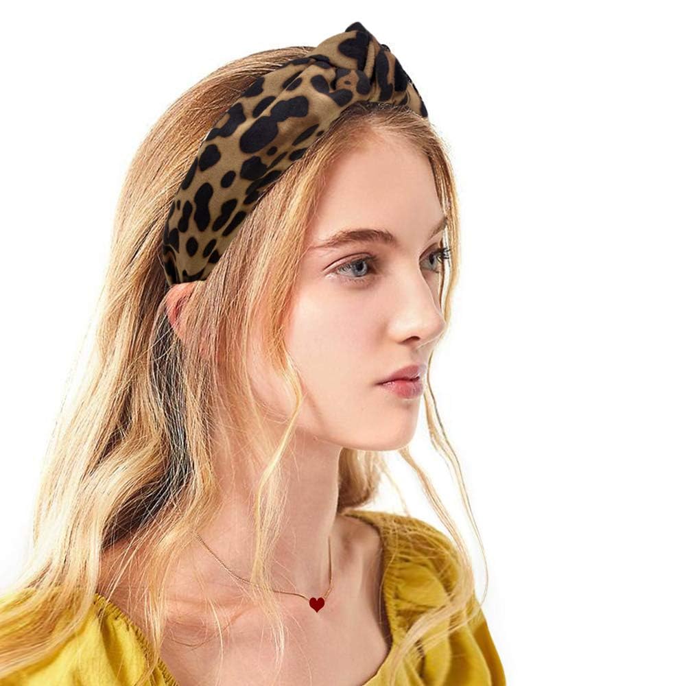 Etercycle headbands held in hand to show scale and lightweight portability