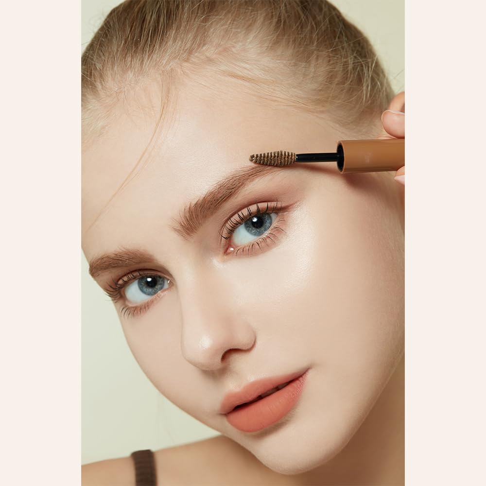 ETUDE lifestyle mirror scene with user applying brows for polished everyday appearance