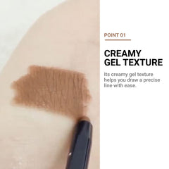 ETUDE pencil held in hand for scale emphasizing travel-friendly compact size