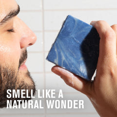 Flatlay of Every Man Jack ingredients like olive oil, coconut, shea and peppermint