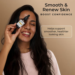 Everyday Beauty applying oil to hair ends to reduce frizz and add shine