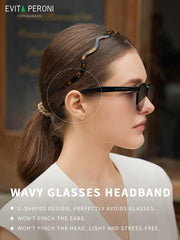 EVITA PERONI close-up acetate texture highlighting durable glossy surface