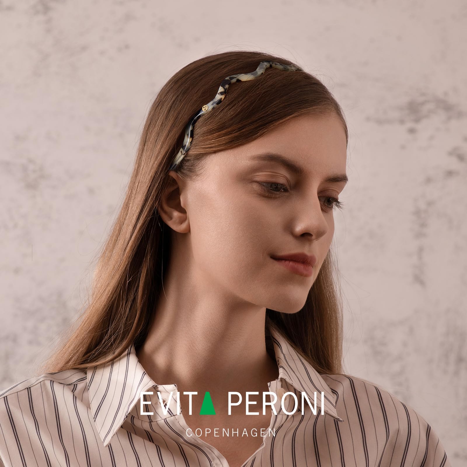 EVITA PERONI worn with glasses demonstrating no interference and comfort
