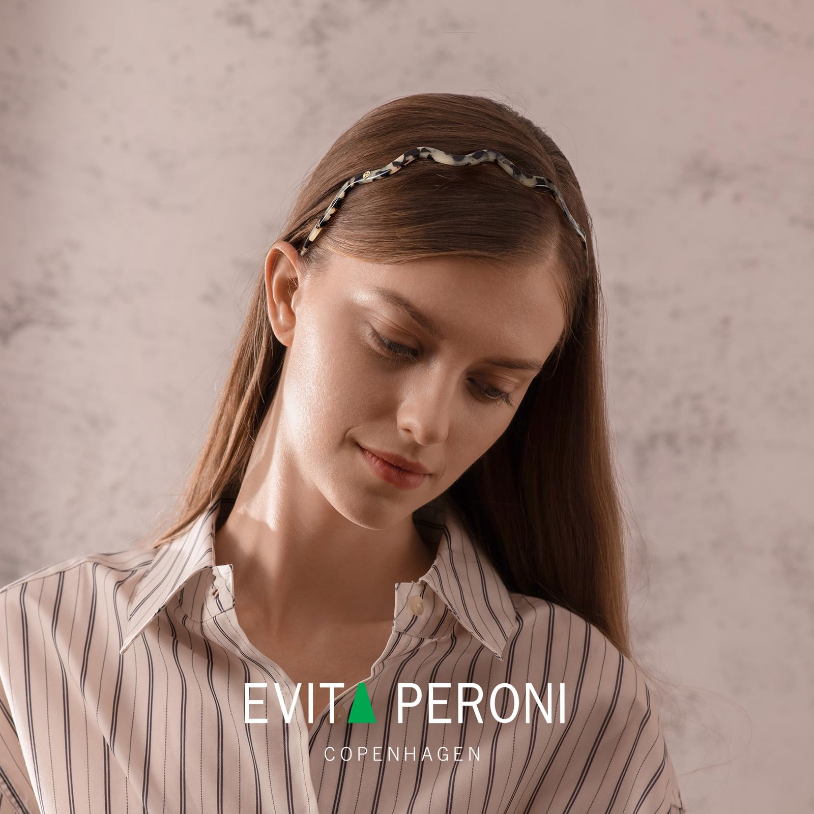 EVITA PERONI velvet pouch protecting band and enhancing presentation