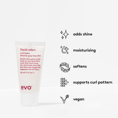 EVO applying balm to damp curls, enhances definition and reduces frizz