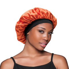 Evolve satin sunset bonnet worn during sleep demonstrating secure overnight protection